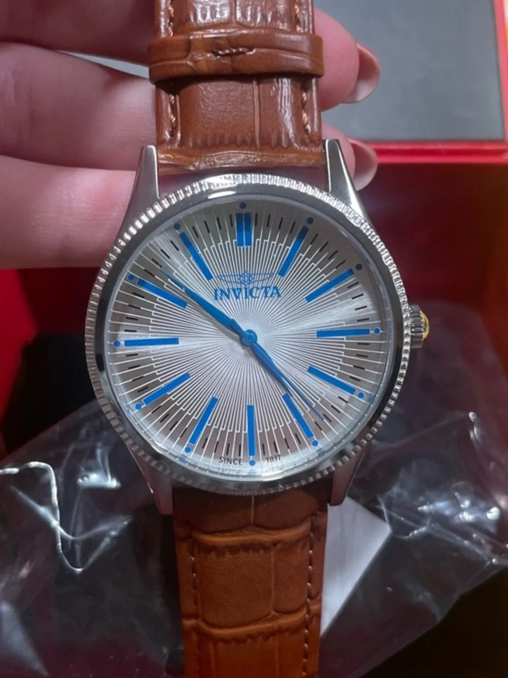Invicta Silver Dial Watch with Blue Accents and Brown Leather Strap